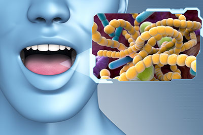 The image shows a 3D rendering of a human face with an open mouth, displaying a biological microscopic view of cells and organelles within the mouth, alongside a graphic representation of bacteria.