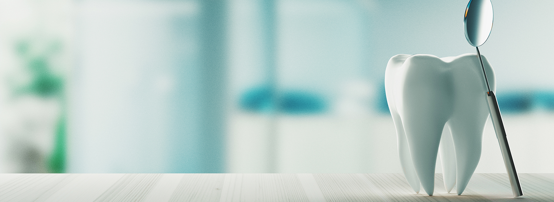 The image depicts a white toothbrush with blue bristles on a countertop, set against the backdrop of a blurred office environment.