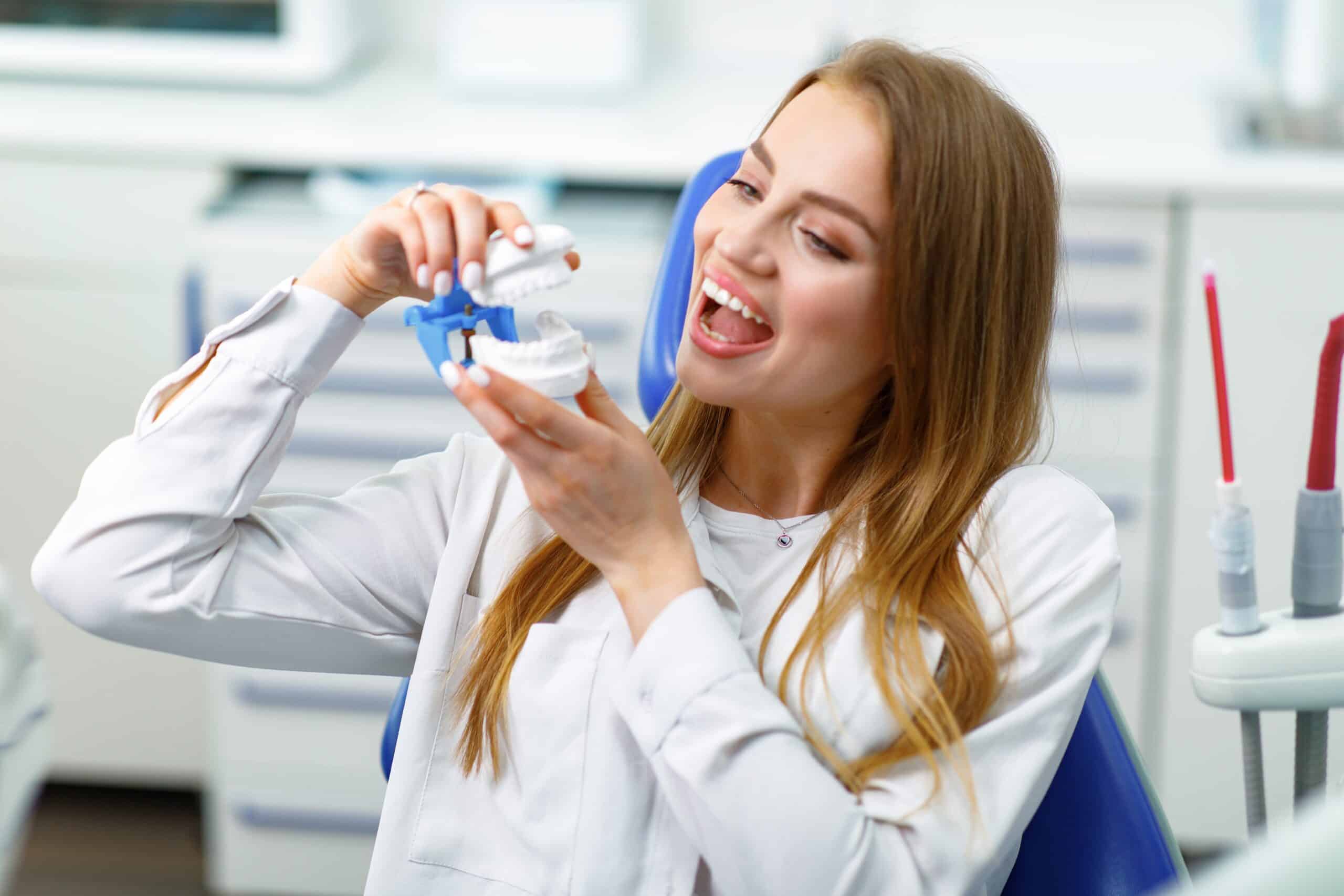 Woman,Dental,Equipment,,Dental,Care,,Treating,Teeth,,Satisfied,Woman,Sitting,